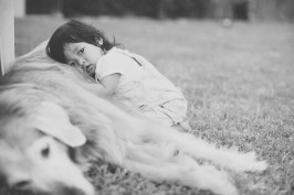 a child hugging doggy children portrait photographer Murphy Texas Portrait Photography