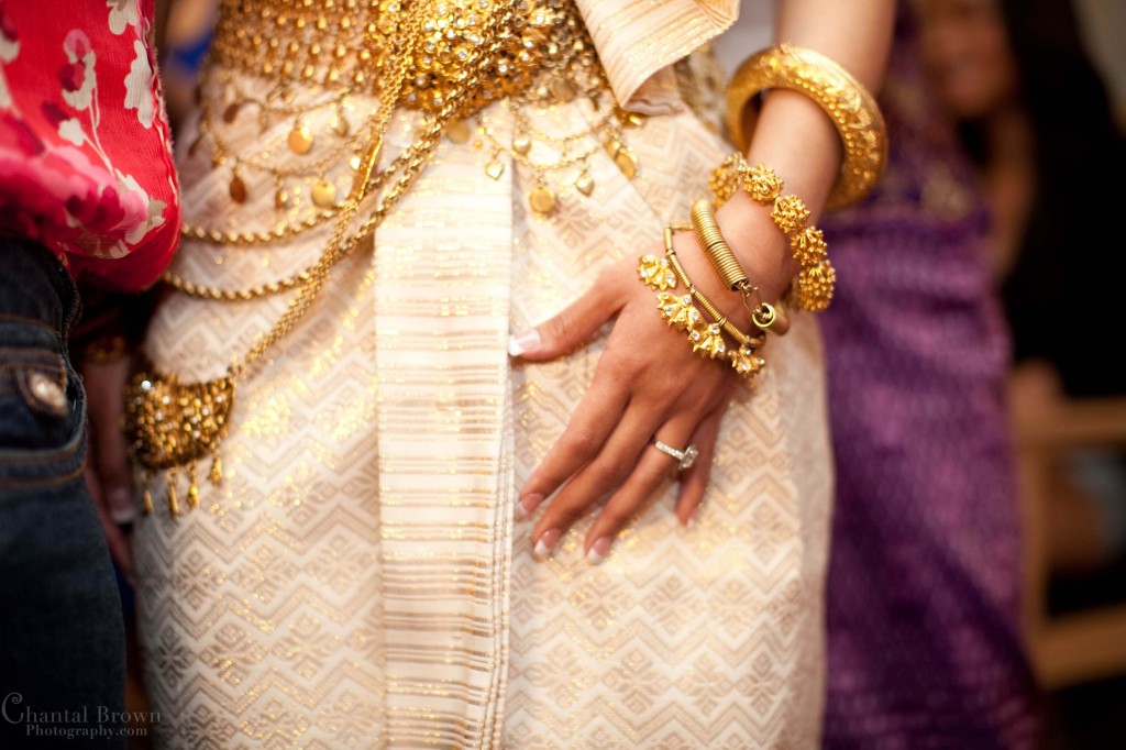 Cambodian Khmer bride accessorize with glamourous and sparkling gold traditional dress Cambodian Khmer bride accessorize with glamourous and sparkling gold traditional dress