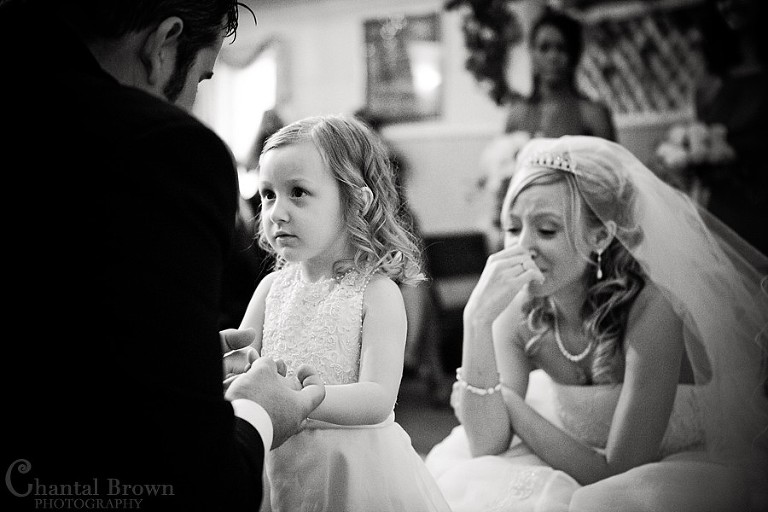daughter giving daddy hug at Grey Stone Chapel in Lawton Oklahoma wedding