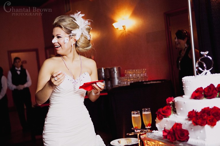 bride eating wedding cake at Southfork Ranch wedding in Parker TX
