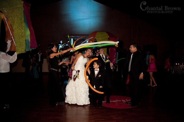 Bride and groom grand exit at Southfork Ranch wedding in Parker TX with balloons