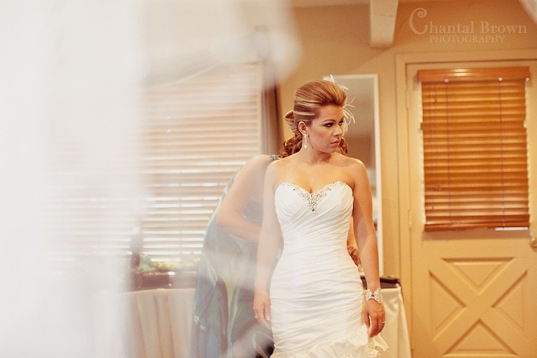 Bride getting ready at Southfork Ranch wedding in Parker TX
