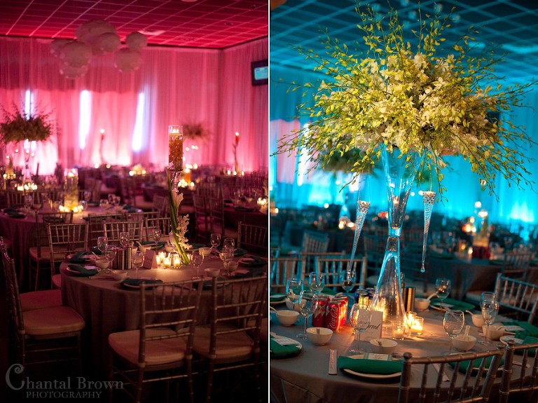 Dallas wedding reception detailed flower centerpieces with pink and blue background light