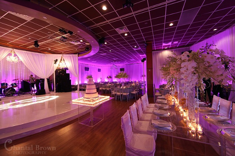 Dallas wedding reception beautiful detailed diamond crystal white roses centerpieces pink light background