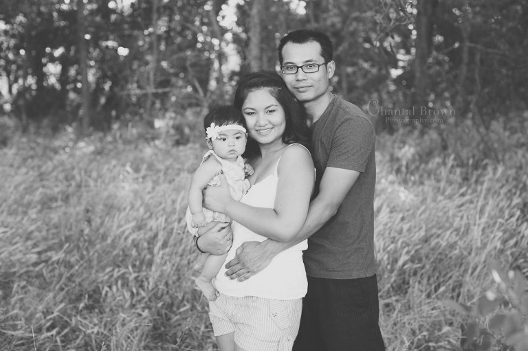Stunning and lovely Family portrait on a grass field