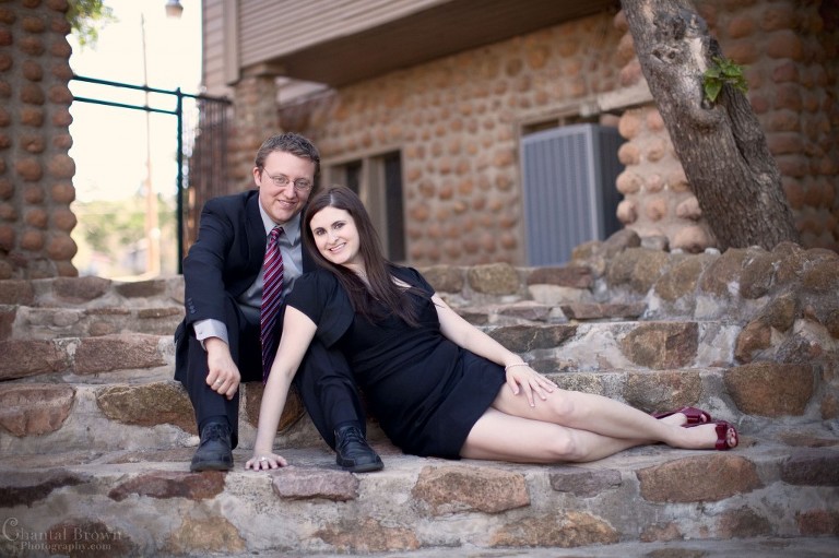 laying-on-medicine-park-lovely-cobblestones-brick-stairway-lawton-engagement-photo