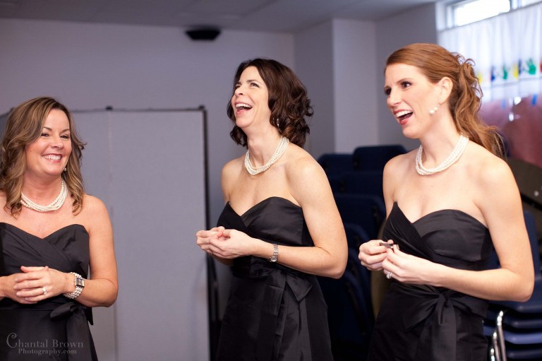 Waters Edge Church Wedding Getting Ready bridesmaid laughing having fun