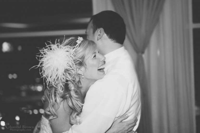 laughing while dancing to wedding song