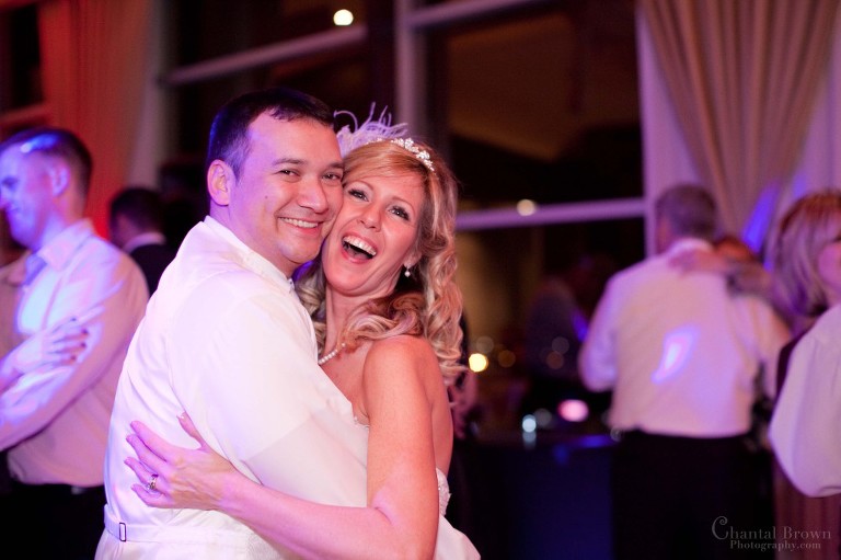 bride and groom having fun at their wedding