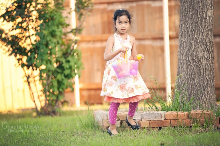 Little-girl-holding-basket-full-of-eggs-Easter-Hunt-Lawton-OK