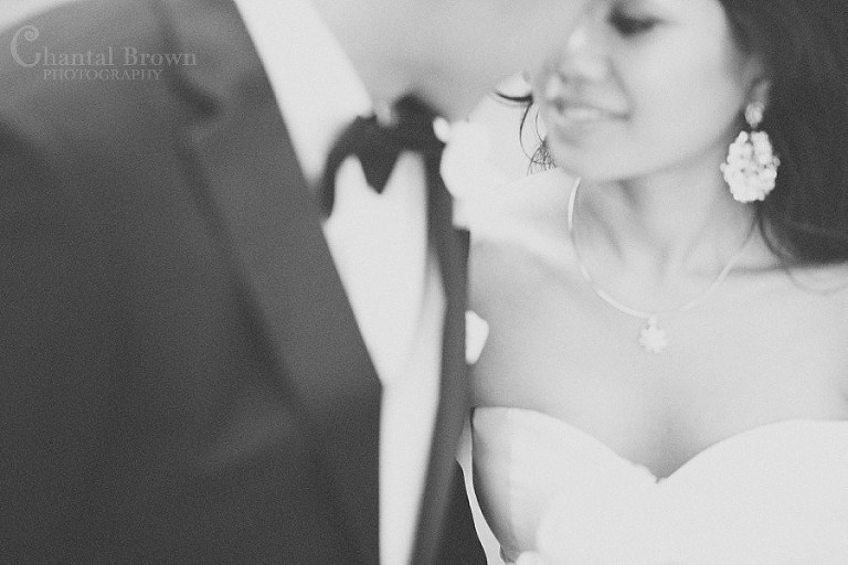 black and white photo bride and groom looking at each other at fairmont roottop terrace fairmont dallas wedding