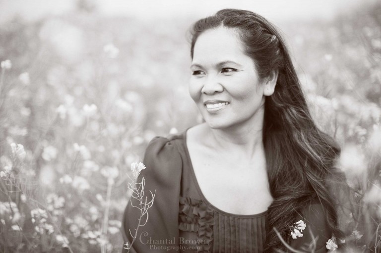 black and white portrait in canola yellow flower fields in Lawton Oklahoma of a mother