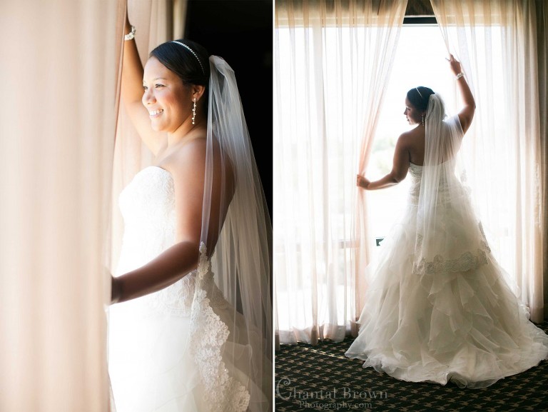 bride standing by window Lawton Country Club Golf Course wedding in Oklahoma