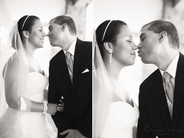 bride groom black white pic kissing on Lawton Country Club Golf Course balcony Oklahoma