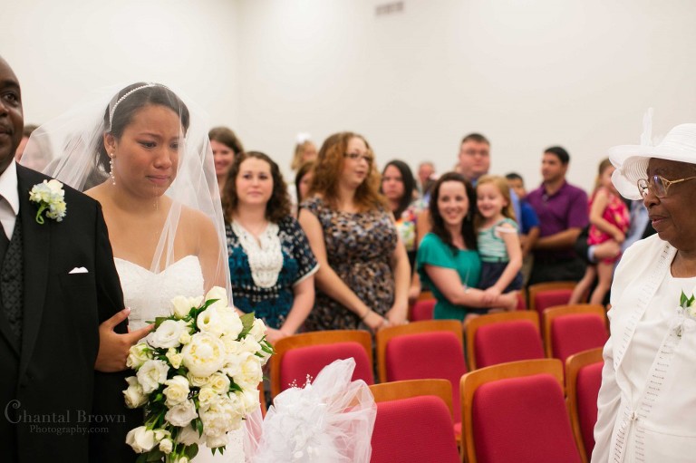 dad walking daughter crying down the aisle wedding ceremony New Light Methodist Church in Lawton Oklahoma