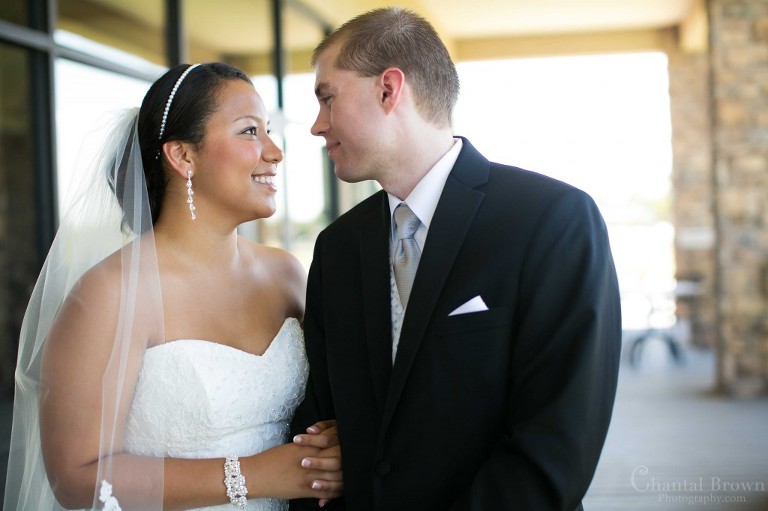 Groom smiling after seeing bride first look in Lawton Country Club Golf Course Oklahoma