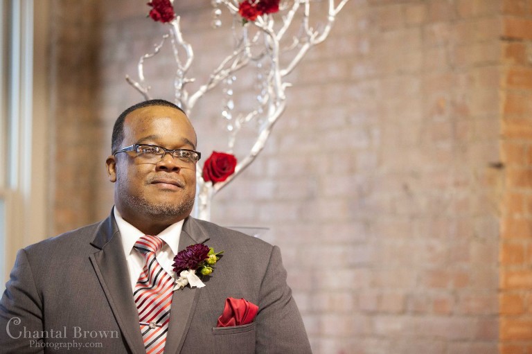emotional groom watching bride walking down the aisle at Dallas Filter Building