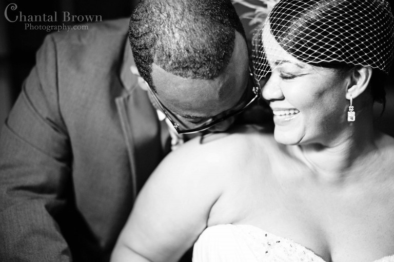 bride groom black white pic smiling and kissing at Dallas Filter building white rock lake