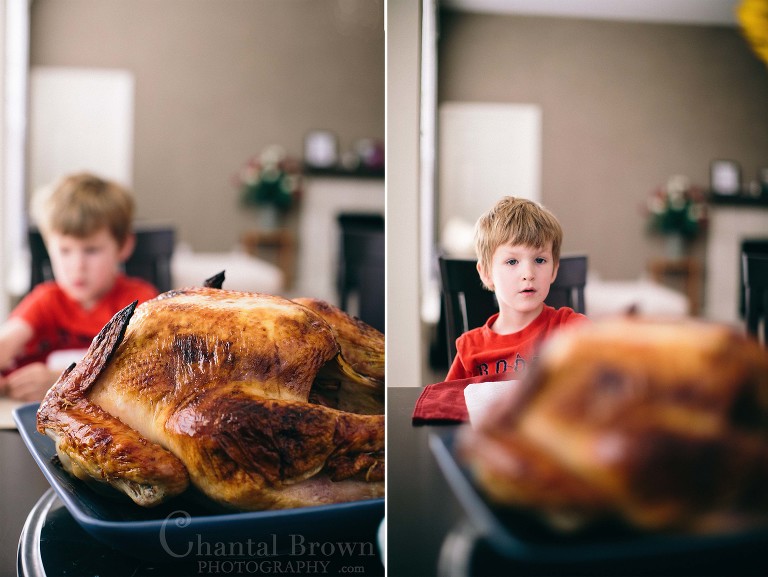 Little boy can't wait to eat turkey for Thanksgiving in Murphy Texas Portrait photographer