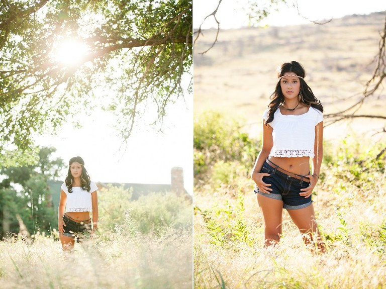 Hippie styled plano wylie senior portraits standing in tall grass field by a house