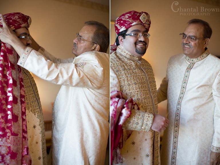 Groom getting ready with father helping and laughing wearing Achkan and Sherwani at Marriott Renaissance hotel Richardson Texas photography