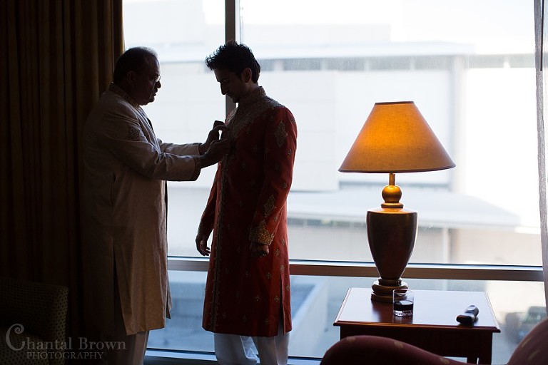 Groom getting ready with father helping at Marriott Renaissance hotel Richardson Texas photography