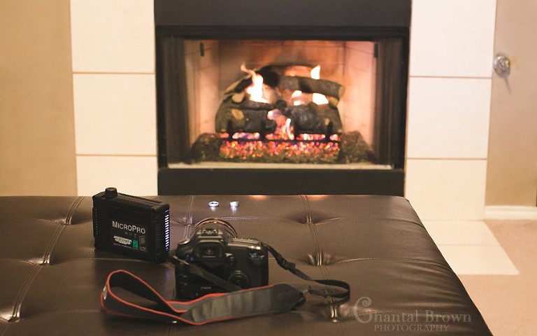 Background set up how to use video light to photography wedding rings by fire place Plano portrait photographer