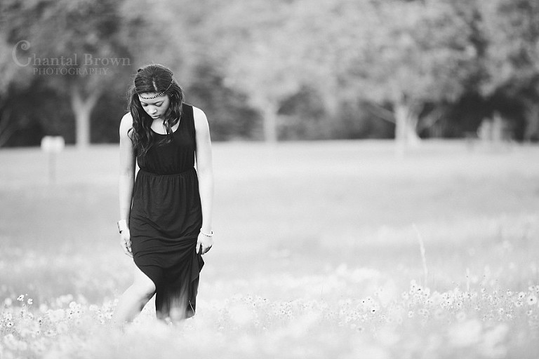Dallas high school senior portraits at White Rock Lake in yellow flower fields black and white