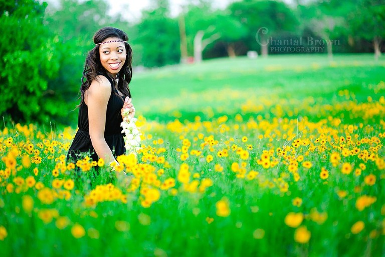 Dallas high school senior pictures at White Rock Lake setting in yellow flower fields