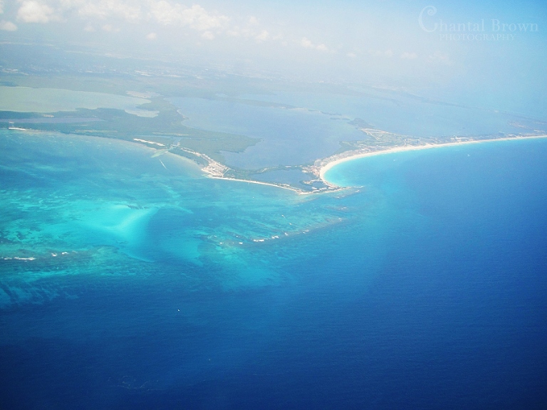 Cancun space sky view from the airplane crystal clue blue water