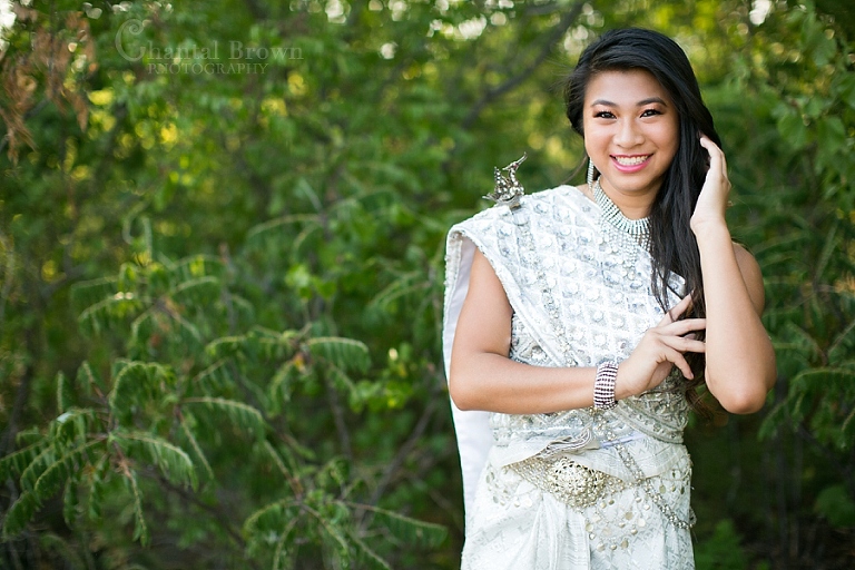 Dallas portrait wearing traditional Khmer Cambodian white silver dress at Arbor Hills Nature Preserve Park in Plano Texas