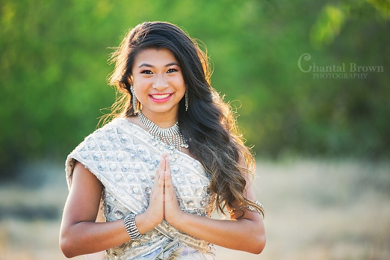 Dallas portrait a girl wearing traditional Khmer Cambodian white silver dress at Arbor Hills Nature Preserve Park in Plano Texas