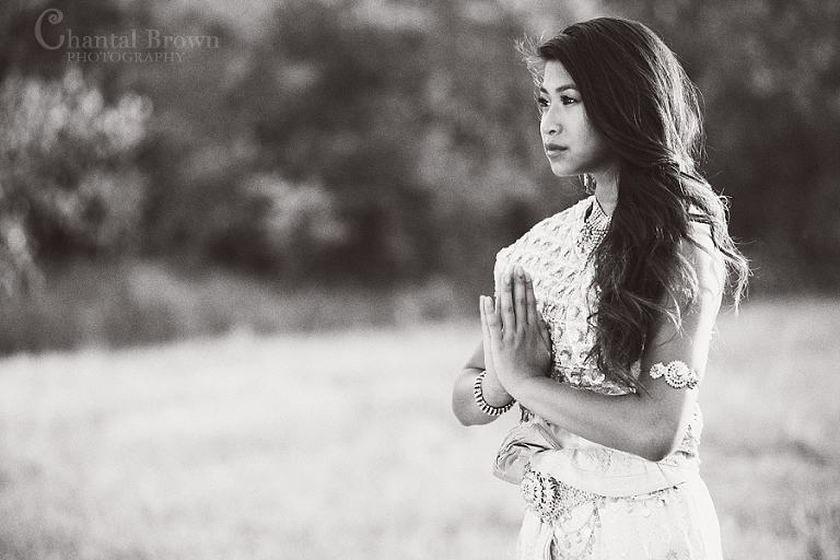 Black and White photo Plano senior portrait wearing traditional Khmer Cambodian white silver dress at Arbor Hills Nature Preserve Park in Plano Texas