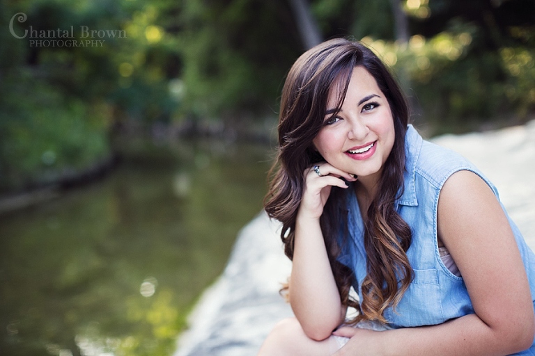 Wylie high school portrait photographer smiling by a creek park