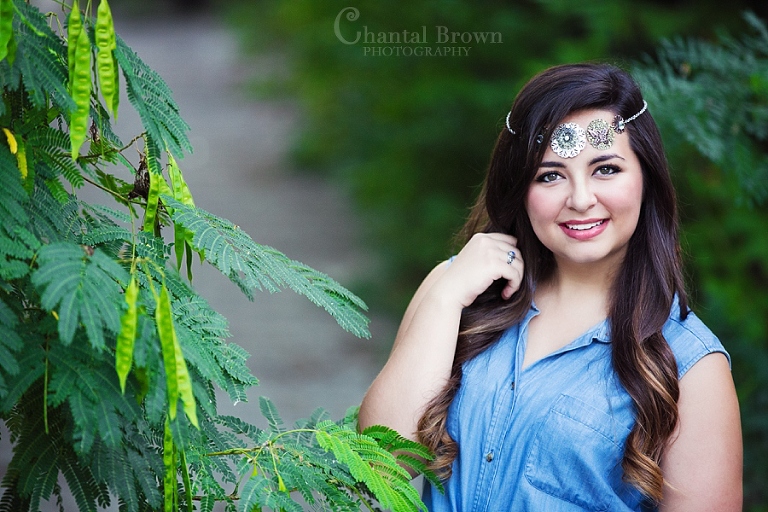 High school senior girl portrait wearing medallion head band at a park in Wylie Texas