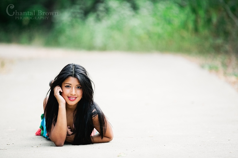 Laying on the sidewalk for Dallas senior portraits class of 2014