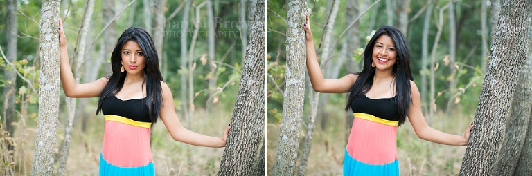 Laughing in the grass golden field for Dallas high school senior picture