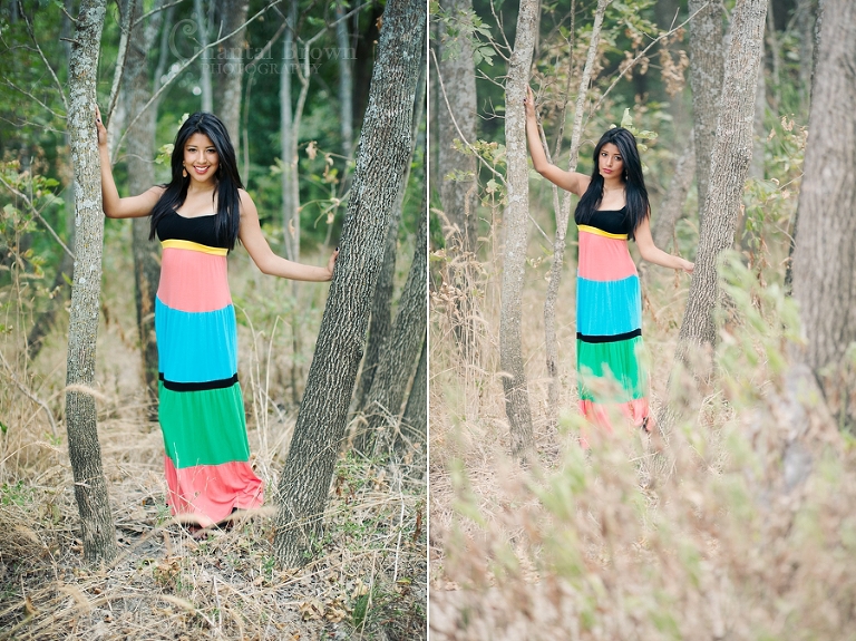 Highland park senior portraits a senior girl standing out in the grass field