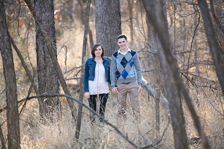 Fort Sill Lawton Oklahoma engagement pictures taken in the forest with beautiful golden sunset with dried trees