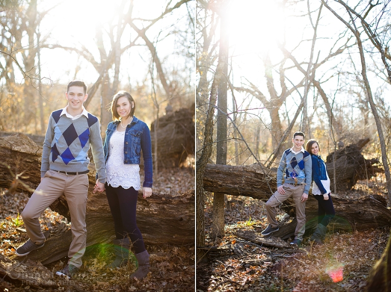 Lawton engagement pictures in the forest by dried tree trunk in fort sill forest by Chantal Brown Photography
