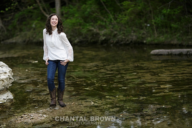 Dallas high school senior picture by water creek taken by Chantal Brown Photography