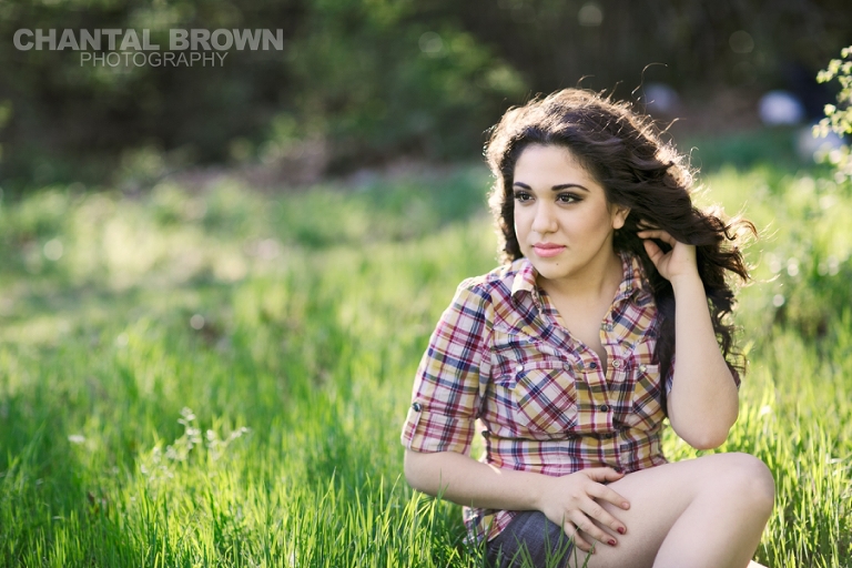 Gorgeous light outdoor Grapevine Texas senior portraits in pretty grass field by Chantal Brown Photography