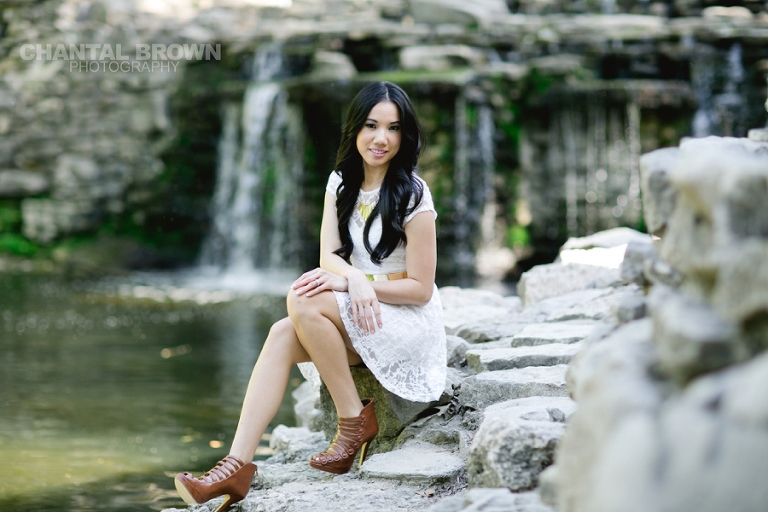 Gorgeous UTA College portraits taken in Richardson Texas at Prairie Creek Park setting by the waterfall senior pictures by Chantal Brown Photography