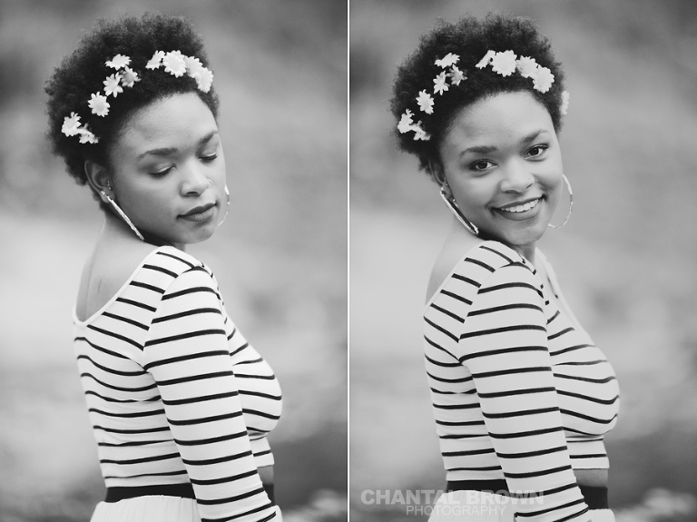 Outdoor Red Oak High School senior portraits at Highland Park in Dallas Texas by water creeks smiling in black and white photo