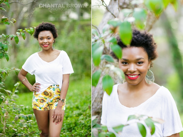 Dallas senior pictures taken at Highland Park Texas standing on a cloud of beautiful grass and surrounded with stunning tall trees.  This Dallas high school senior portraits is taken by Chantal Brown Photography.