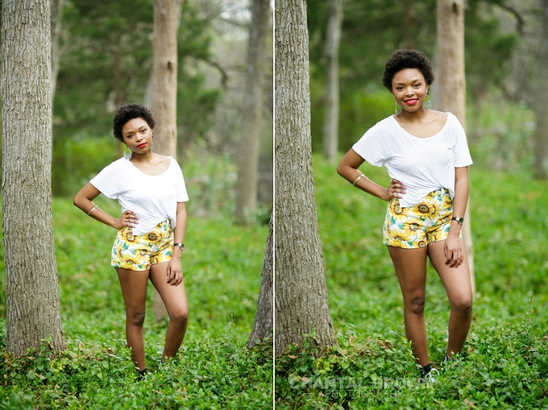 Dallas senior pictures taken at Highland Park Texas standing on a cloud of beautiful grass and surrounded with stunning tall trees.  This Dallas high school senior portraits is taken by Chantal Brown Photography.