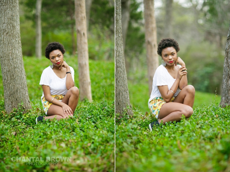 Dallas senior pictures taken at Highland Park Texas setting on a cloud of beautiful grass and surrounded with stunning tall trees.  This Dallas high school senior portraits is taken by Chantal Brown Photography.