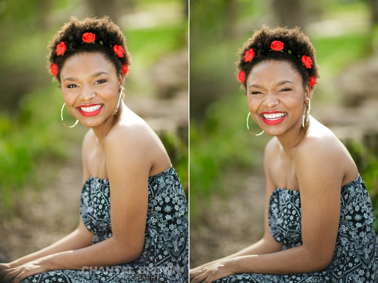 Highland Park Dallas senior pictures of a beautiful high school girl wearing a very pretty red roses head band setting on a big rock laughing really hard and having fun.  This picture was taken by Chantal Brown Photography.