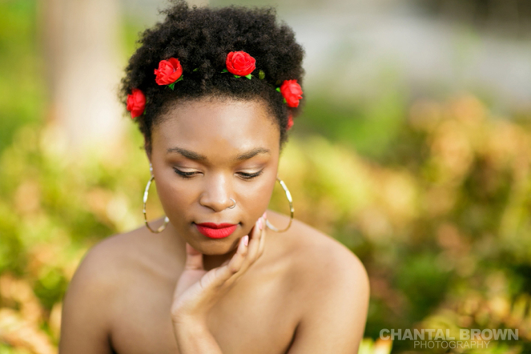 Highland Park Dallas senior pictures of a beautiful high school girl wearing a very pretty red roses head band