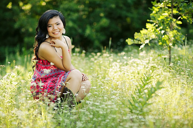 Carrollton Creekview senior portraits of a high school student taken outdoor with beautiful sunlight as backlight.